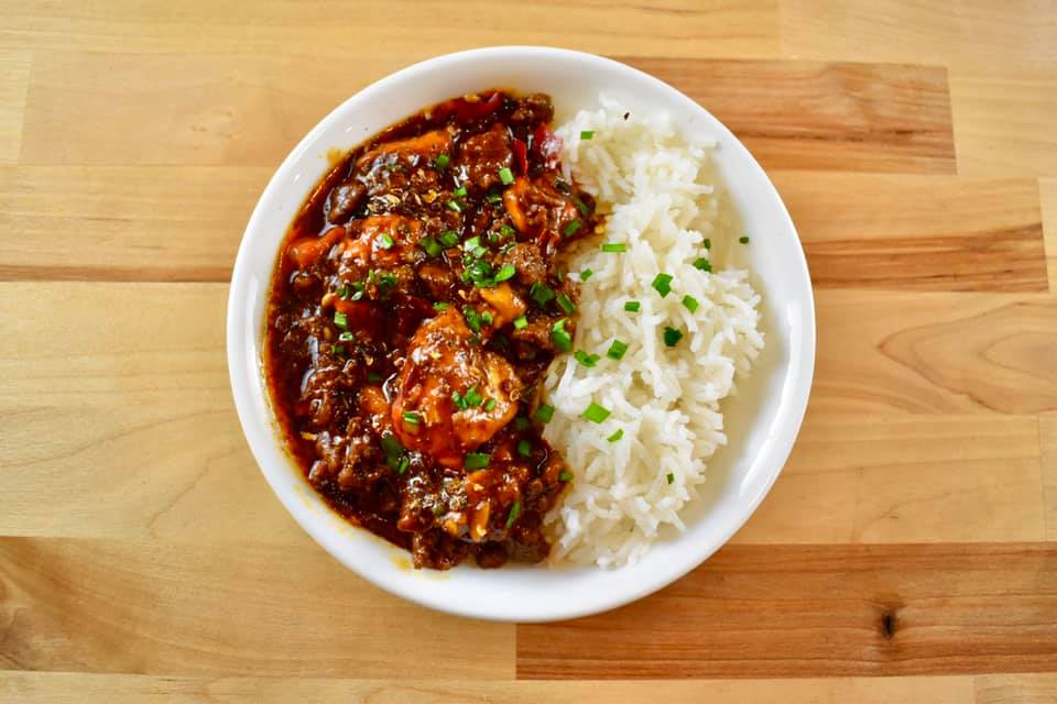 white bowl filled with half mapo tofu and half white rice