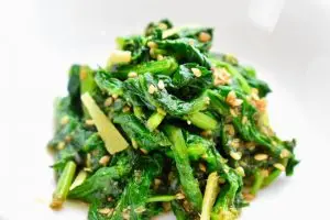 blanched spinach dressed in sesame sauce