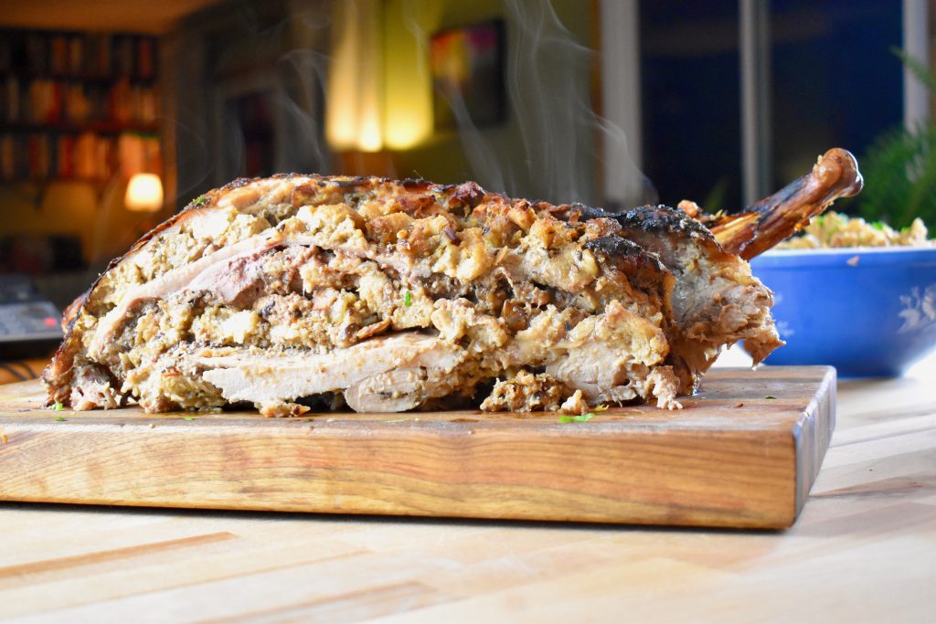 Roasted turducken cut in half to see a cross section