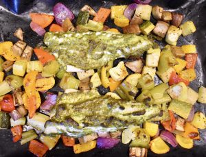 sheet pan with baked walleye and veggies