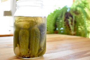 open jar of dill pickles