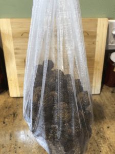 walnuts in mesh bag