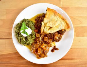 steak and kidney pie with mango chutney and saag