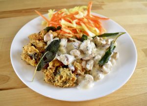 country fried goose gizzards with sausage gravy and salad