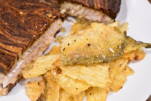 the walleye reuben, fried fish skins