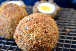 scotch eggs on cooling rack