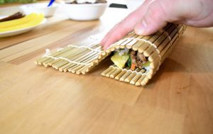 rolling the kimbap