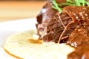 Chipotle Slow Roasted Venison on Hatch Grits