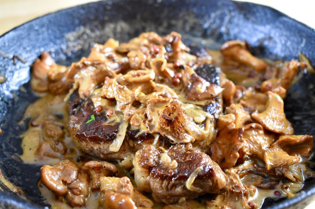 Ribeye with Chanterelle and Pink Peppercorn Cream Sauce